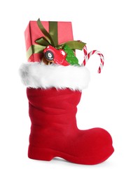 Photo of Happy Saint Nicholas day. Red boot with sweets and gift box isolated on white