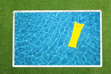 Image of Inflatable mattress floating in swimming pool surrounded by green grass, top view
