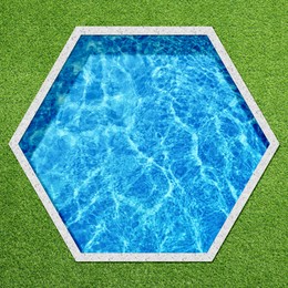 Image of Hexagonal swimming pool surrounded by green grass, top view