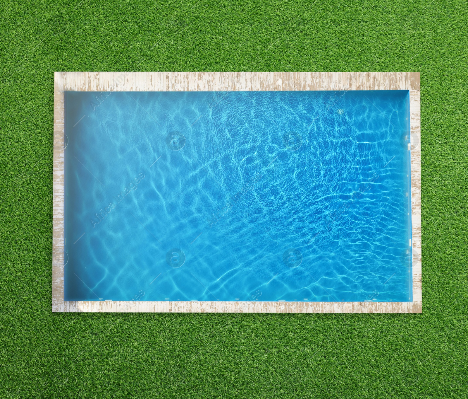 Swimming pool surrounded by green grass, top view Image of Swimming pool surrounded by green grass, top view
