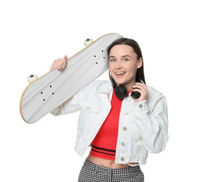 Image of Smiling woman with skateboard on white background