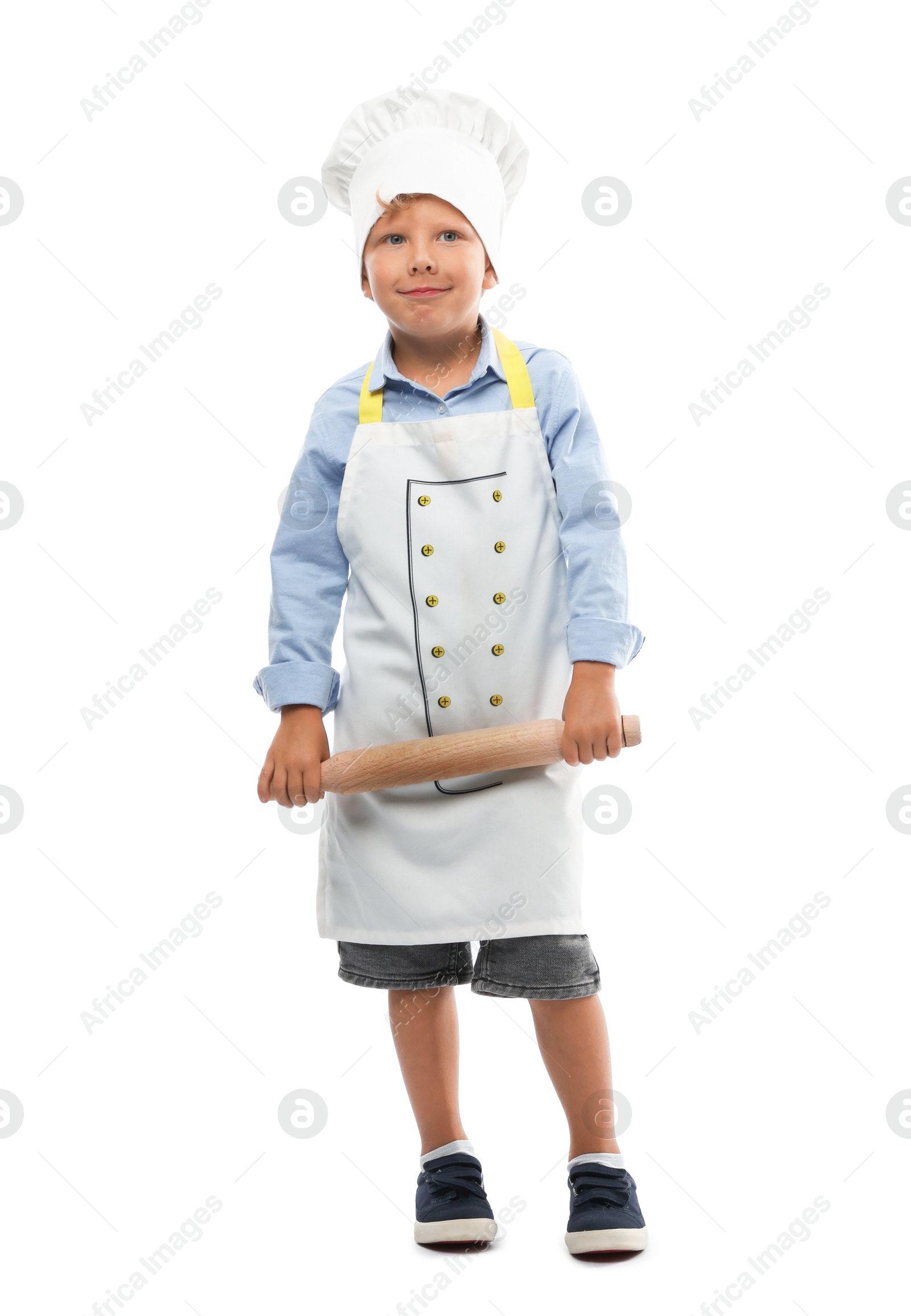 Photo of Choice of profession. Little boy with rolling pin pretending to be chef on white background