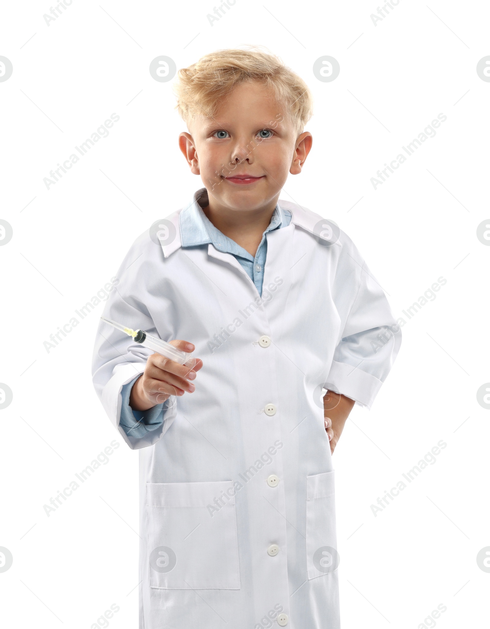 Photo of Choice of profession. Little boy with syringe pretending to be doctor on white background