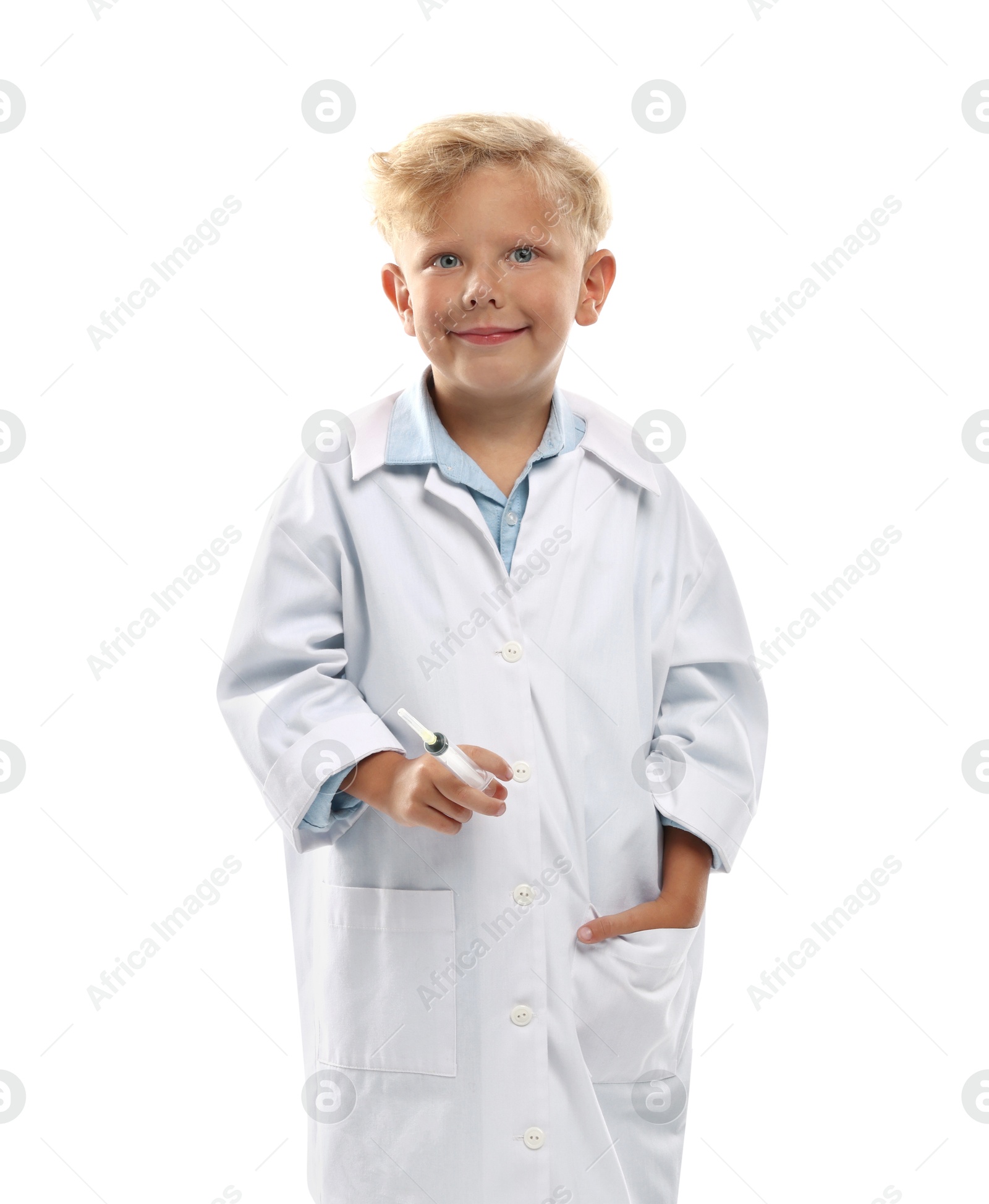 Photo of Choice of profession. Little boy with syringe pretending to be doctor on white background