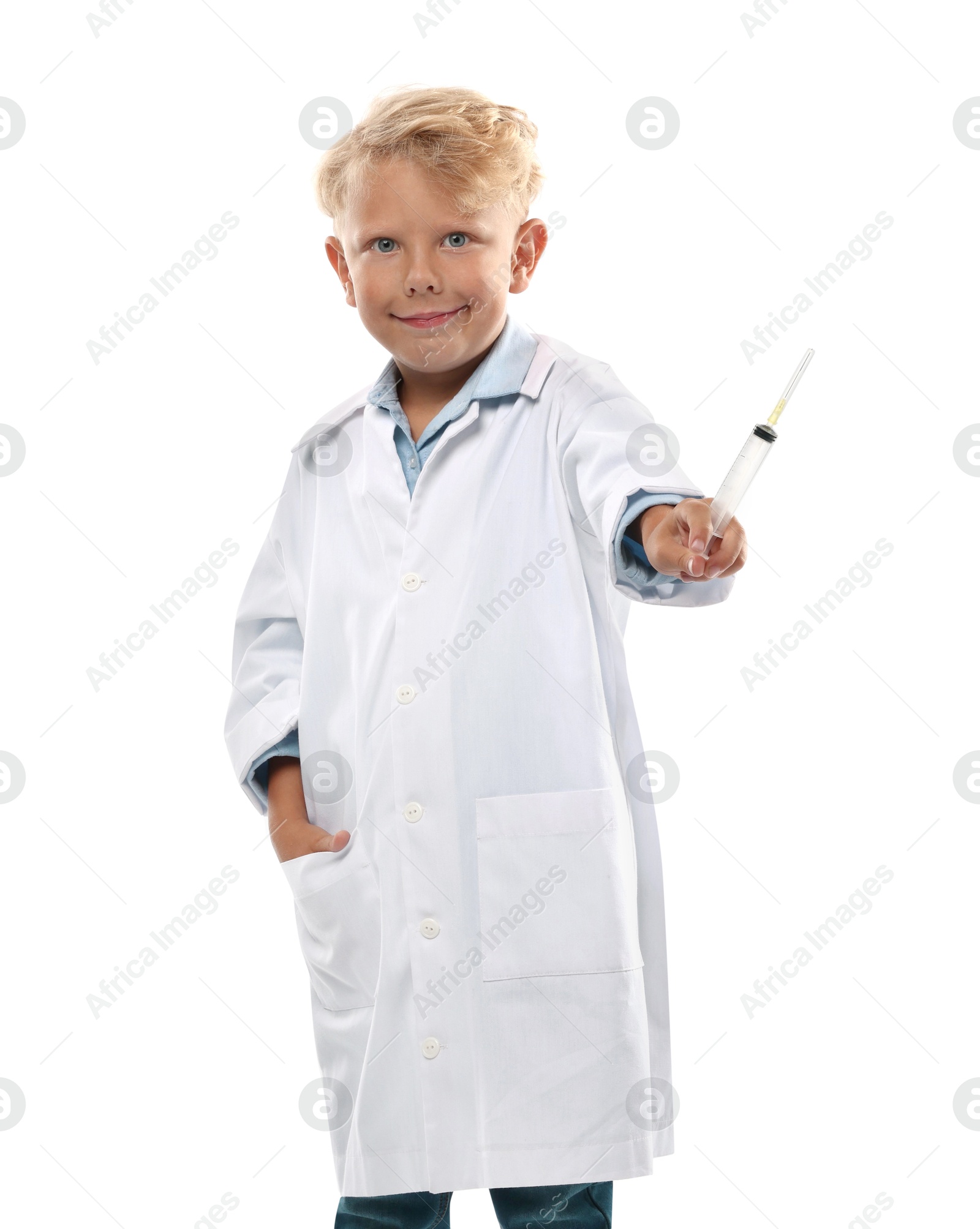 Photo of Choice of profession. Little boy with syringe pretending to be doctor on white background