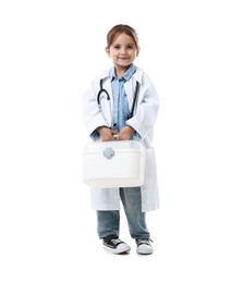 Photo of Choice of profession. Little girl in uniform with stethoscope and case pretending to be doctor on white background