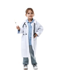 Photo of Choice of profession. Little girl in uniform with stethoscope and syringe pretending to be doctor on white background