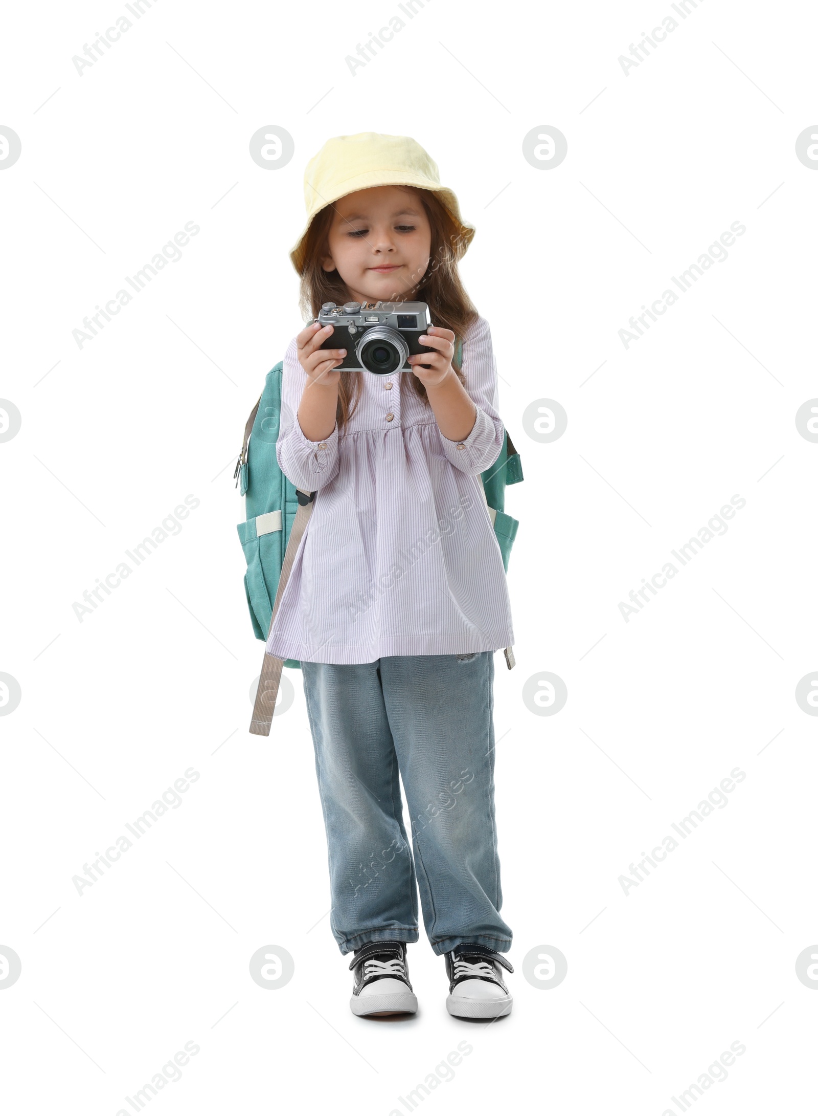 Photo of Choice of profession. Little girl with camera pretending to be photographer on white background
