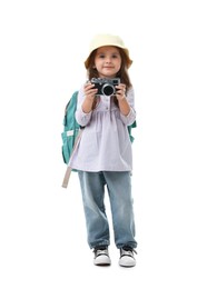Photo of Choice of profession. Little girl with camera pretending to be photographer on white background