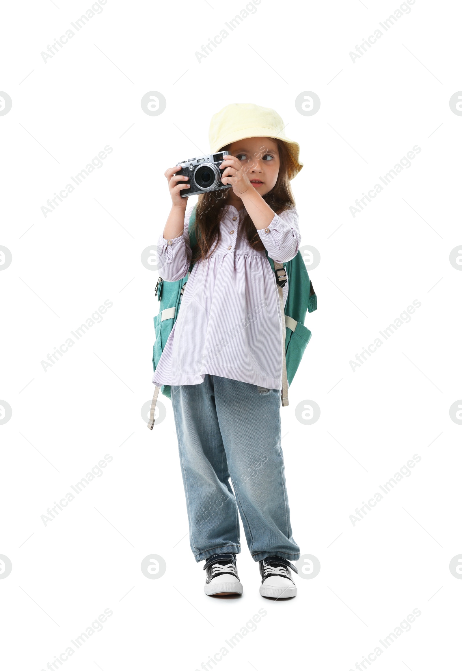 Photo of Choice of profession. Little girl with camera pretending to be photographer on white background