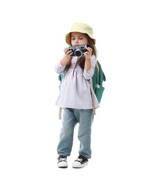 Photo of Choice of profession. Little girl with camera pretending to be photographer on white background