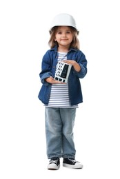 Photo of Choice of profession. Little girl in hardhat with building model pretending to be architect on white background