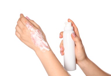 Photo of Woman applying healing cream onto burned hand on white background, closeup