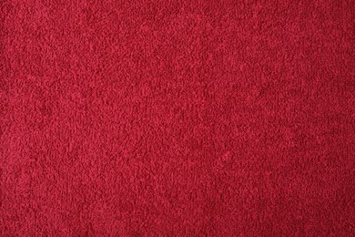 Photo of Red terry towel as background, top view