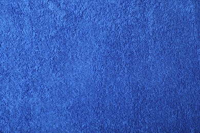 Photo of Blue terry towel as background, top view