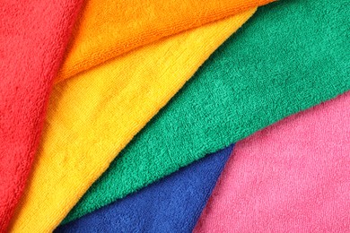 Photo of Bright terry towels as background, above view