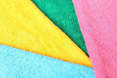 Photo of Bright terry towels as background, above view