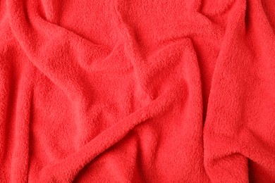 Photo of Red terry towel as background, top view