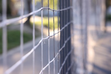 Photo of Sport net outdoors at morning, closeup view
