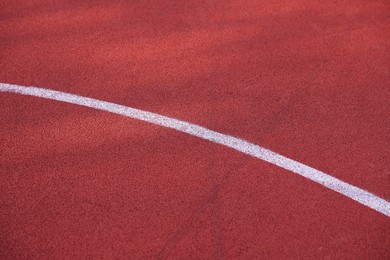 Photo of Red running track with marking, above view