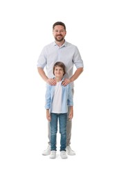 Photo of Father and son posing on white background