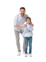 Photo of Father and son posing on white background