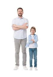Photo of Father and son posing on white background