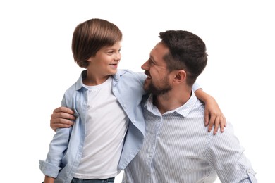 Photo of Father and son posing on white background