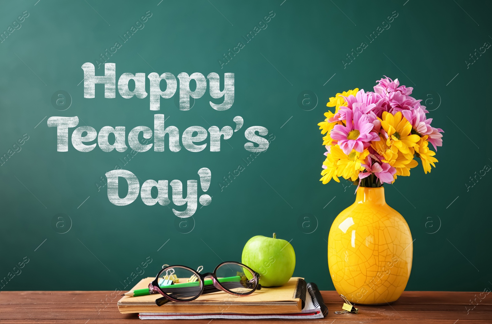 Image of Happy Teacher's Day greeting card with flowers and text on green chalkboard
