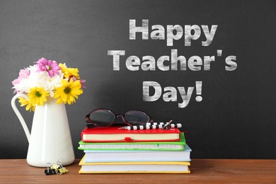 Image of Happy Teacher's Day greeting card with flowers and text on blackboard