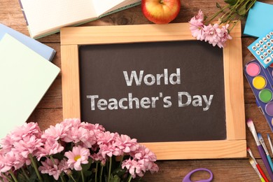 Image of Happy Teacher's Day greeting card with flowers and text on small chalkboard
