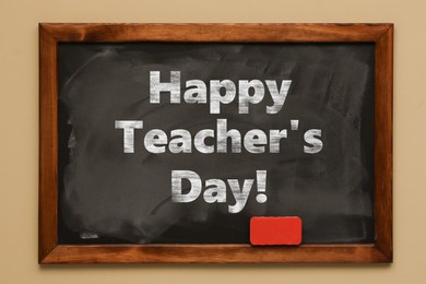 Image of Happy Teacher's Day greeting card. Text on blackboard
