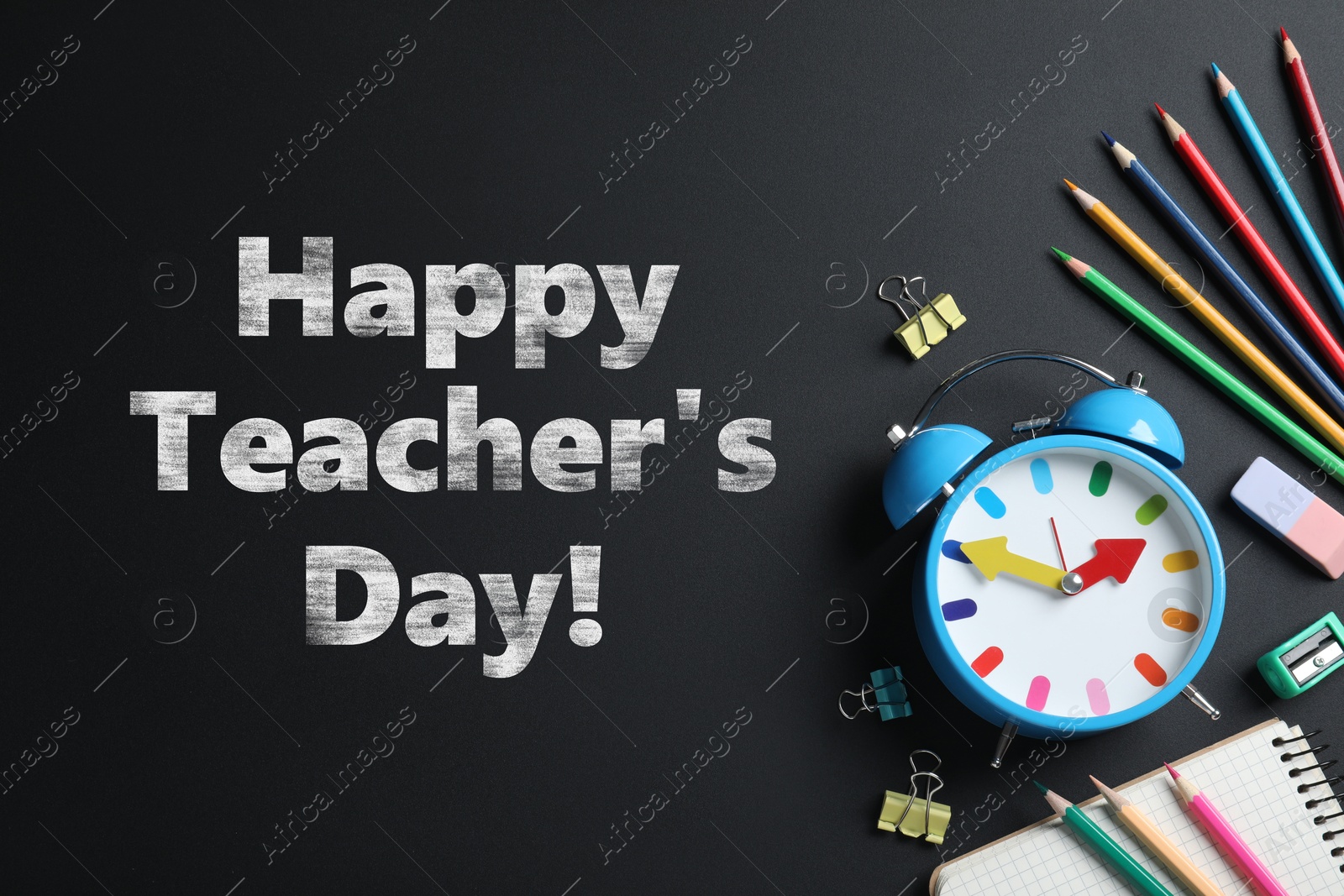 Image of Happy Teacher's Day greeting card with stationery and text on blackboard
