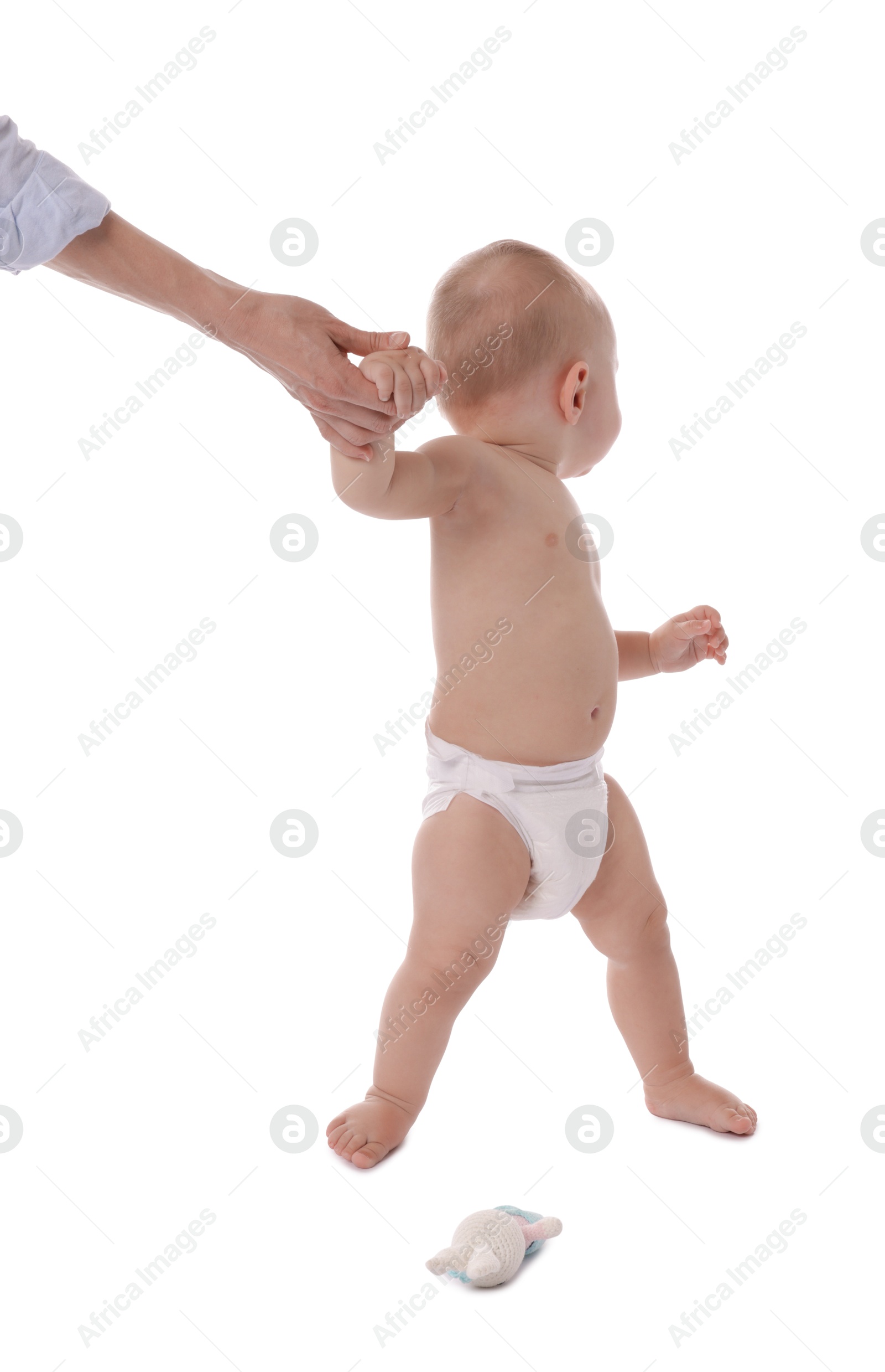 Photo of Cute little baby standing on white background