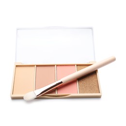 Photo of Beautiful contouring palette with brush isolated on white