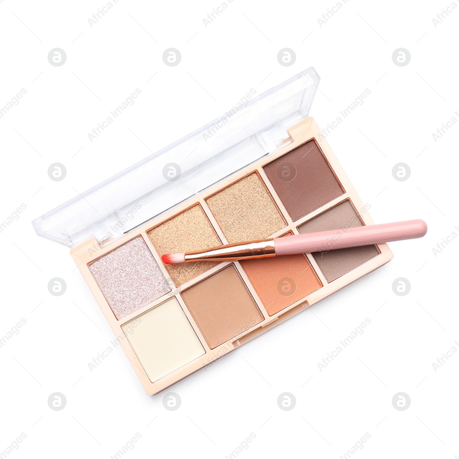 Photo of Beautiful eyeshadow palette with brush isolated on white, top view
