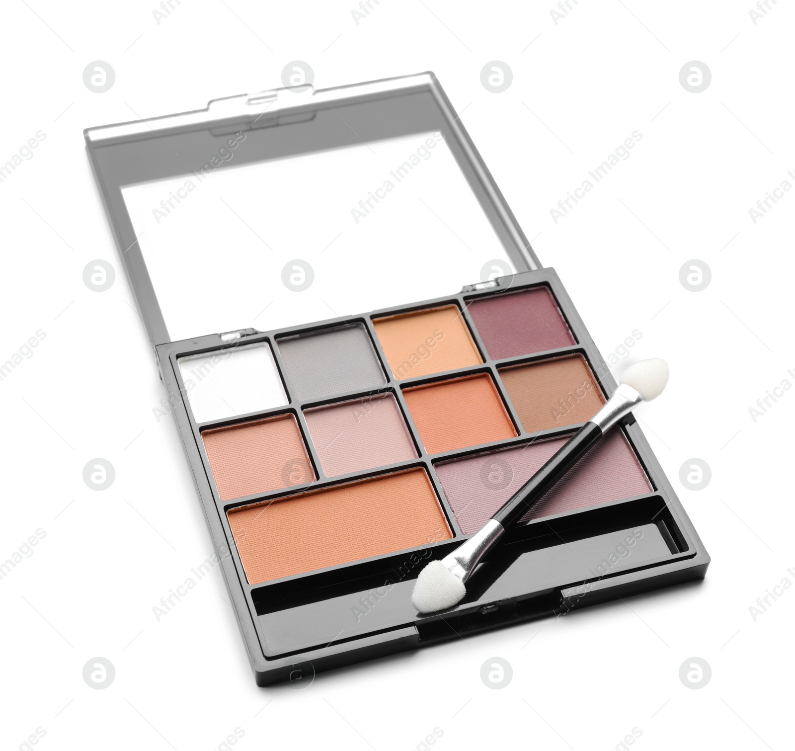 Photo of Beautiful eyeshadow palette with applicator isolated on white