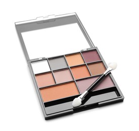 Photo of Beautiful eyeshadow palette with applicator isolated on white