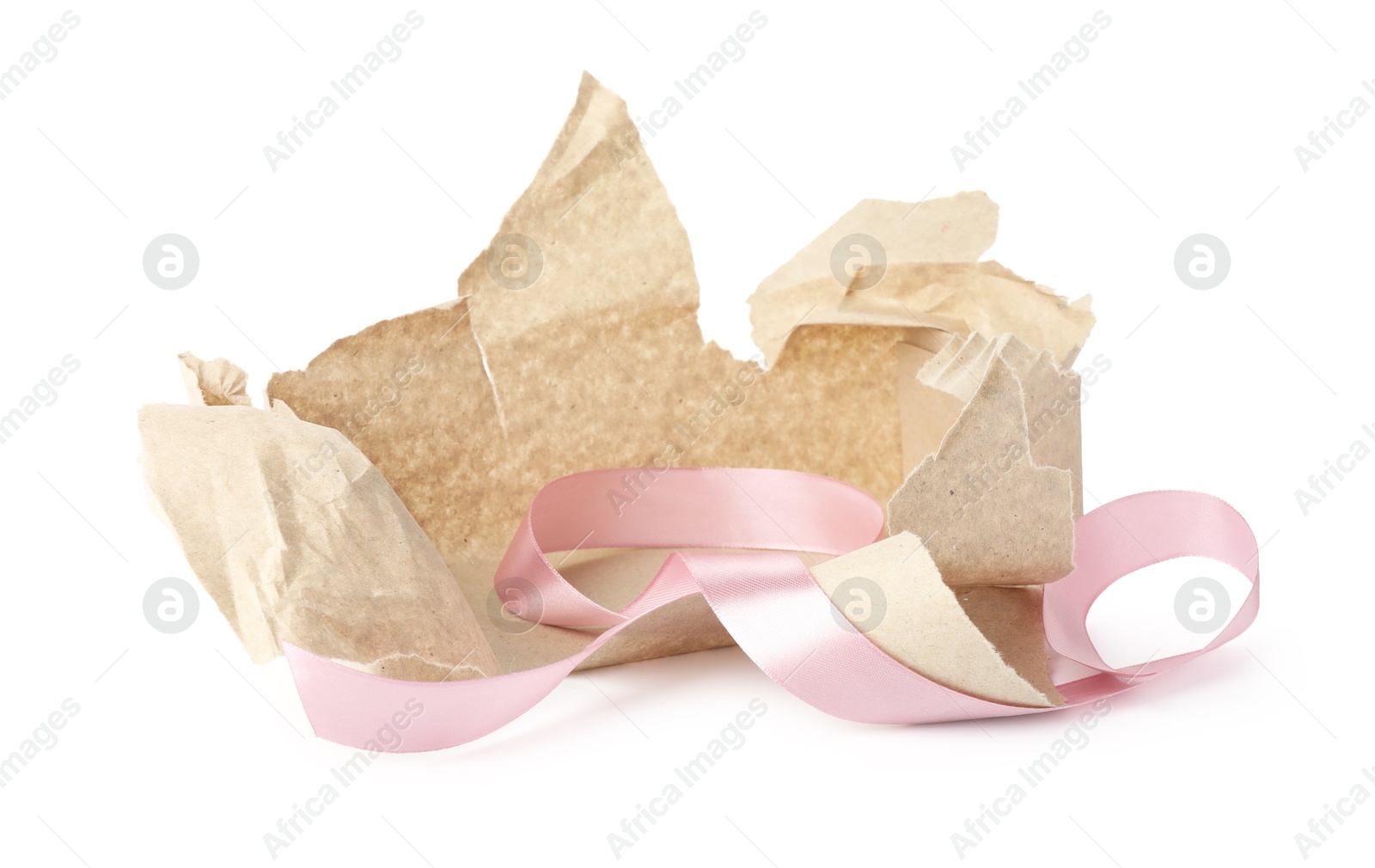 Photo of Torn wrapping paper and ribbon isolated on white
