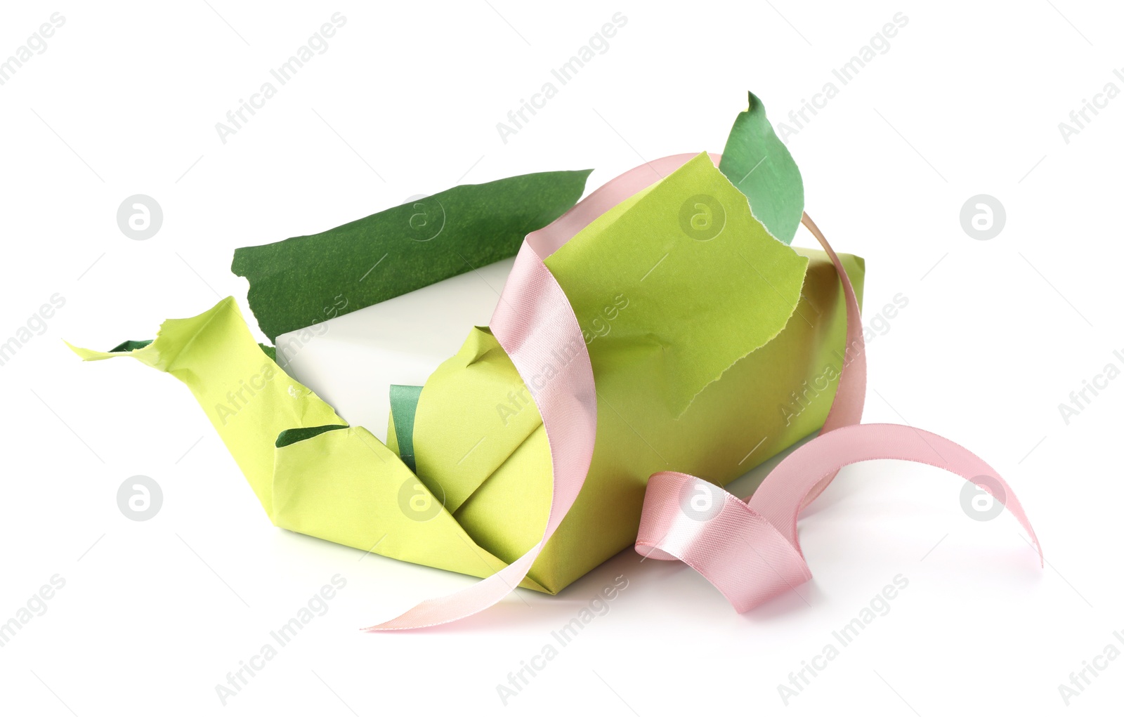 Photo of One unwrapped gift box isolated on white