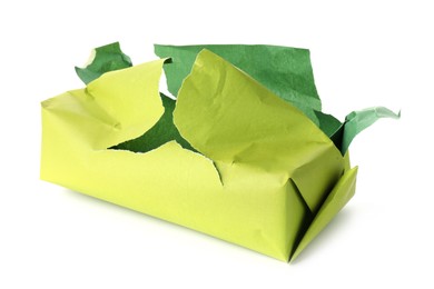 Photo of Opening gift. Torn wrapping paper isolated on white