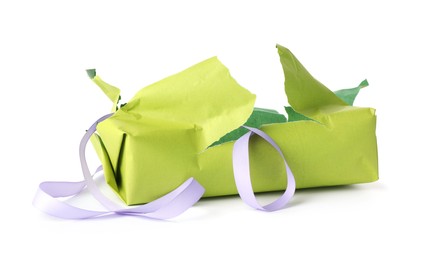 Photo of Torn wrapping paper and ribbon isolated on white