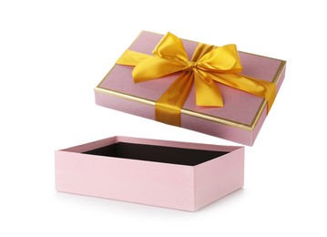Photo of One opened gift box isolated on white