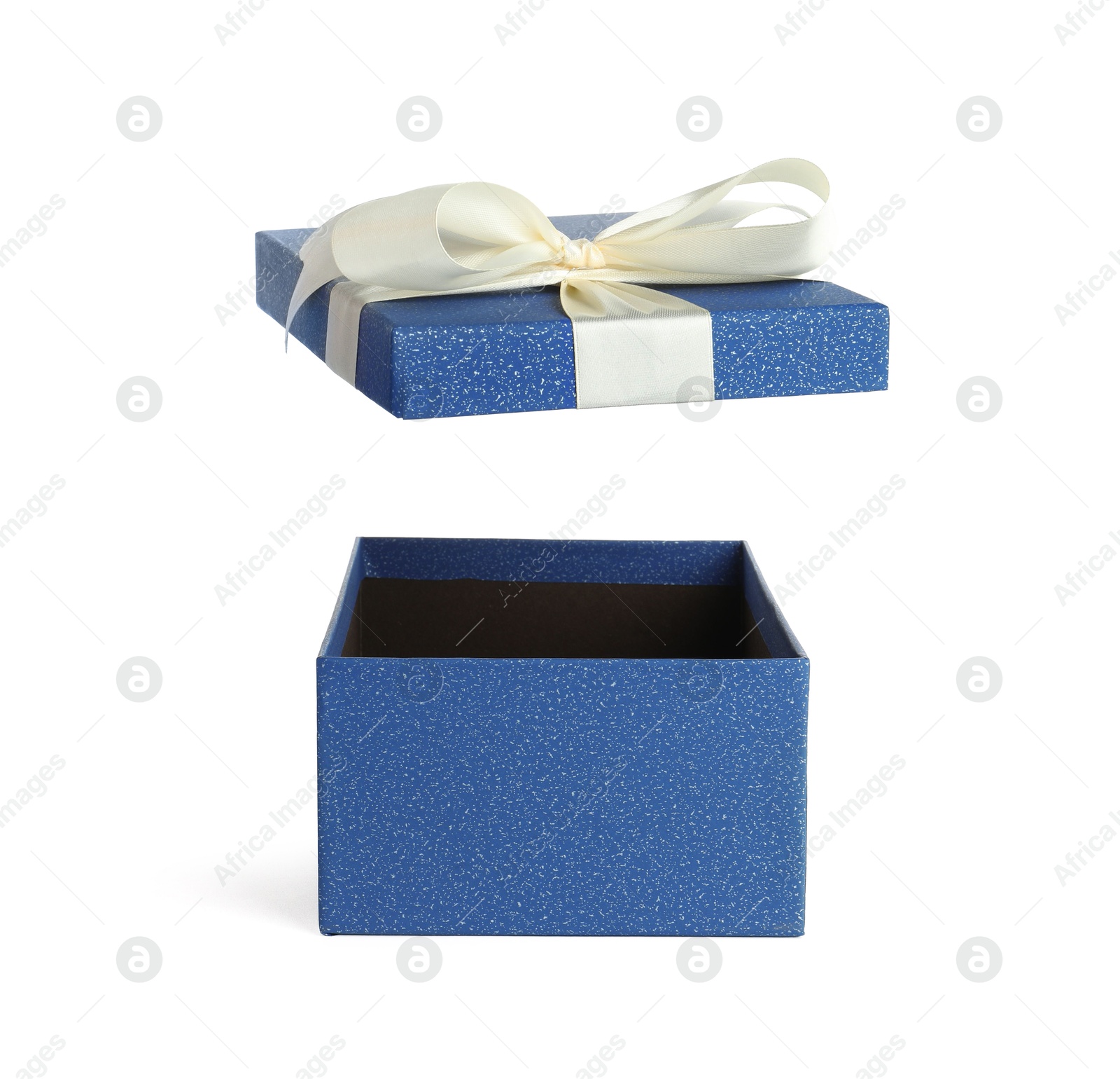 Photo of One opened gift box isolated on white