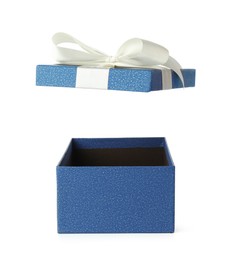 Photo of One opened gift box isolated on white