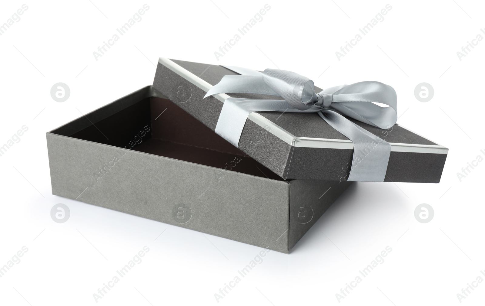 Photo of Open gift box with beautiful lid isolated on white