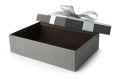 Photo of Open gift box with beautiful lid isolated on white