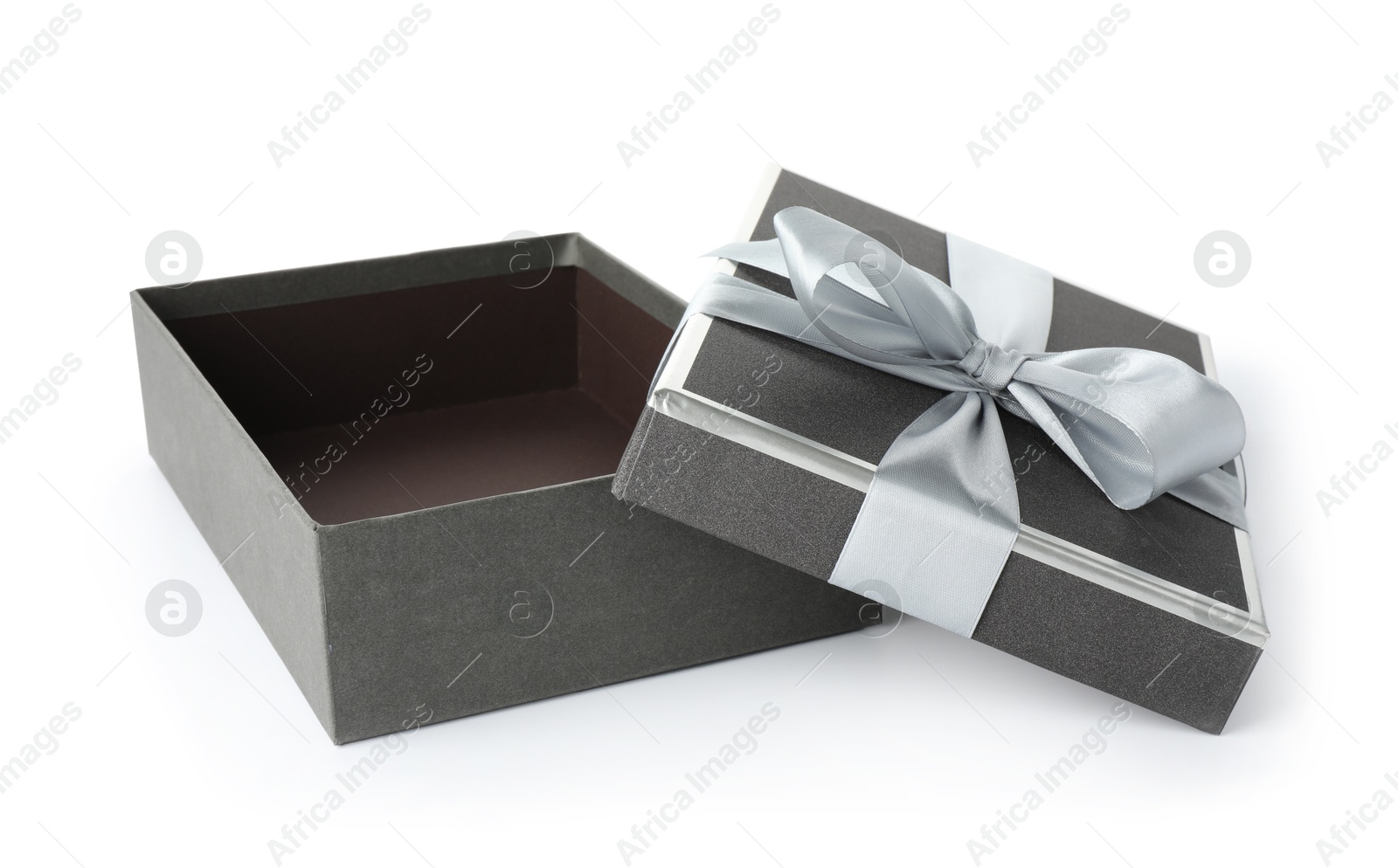 Photo of Open gift box with beautiful lid isolated on white