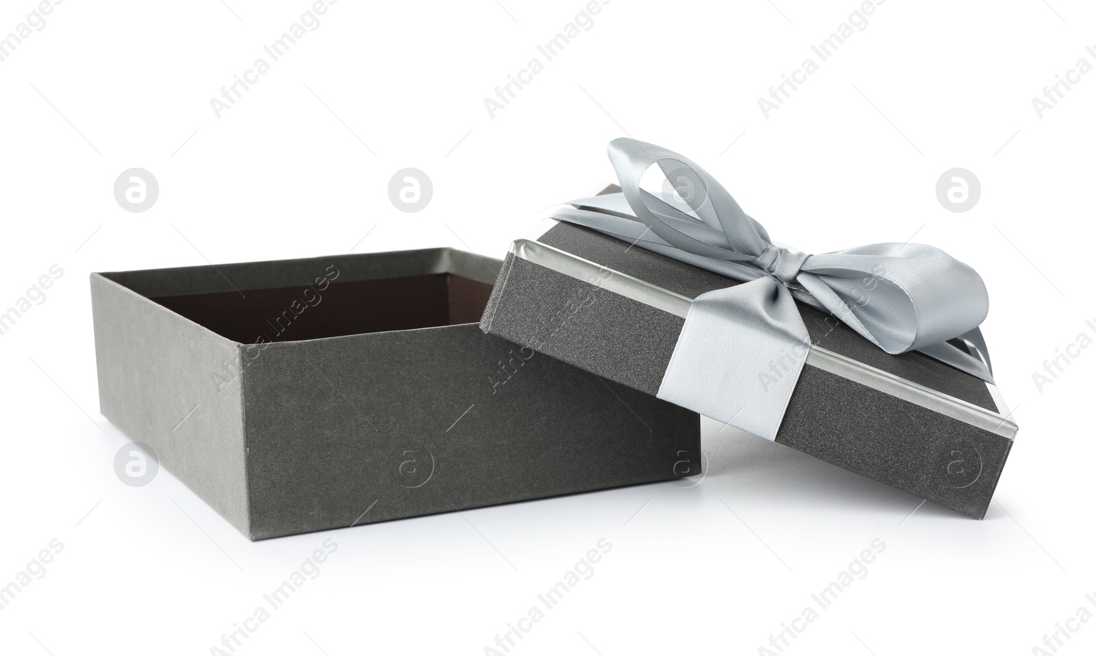 Photo of Open gift box with beautiful lid isolated on white