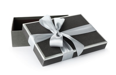 Photo of Open gift box with beautiful lid isolated on white